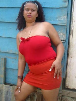 Lasidy Sexy Busty Black Dominican Girl in a Red Dress