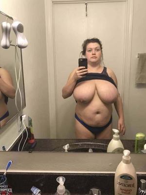 Her husband shows everyone her huge fat tits