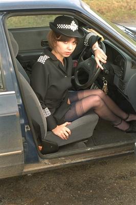 Uniforms - WPC steps out of car and shows herself