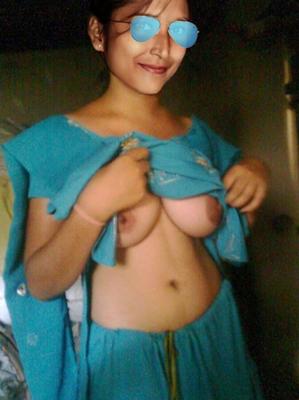 Indian TEEN BHARATI Lifts Her Dress To Show Her TITS