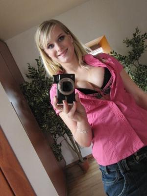 Blonde in front of the mirror