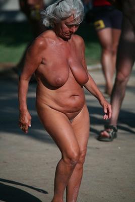 Tanned Nudist Granny with HUGE TITS!