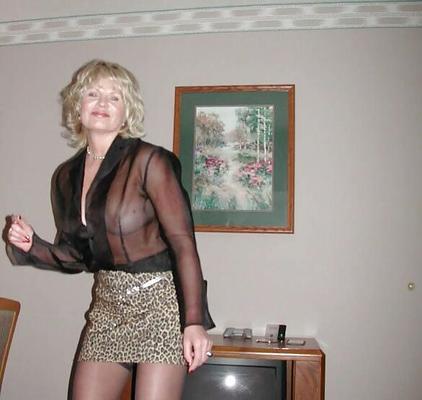 mature blonde   hotel stripping