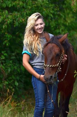 Girl riding her Horse Topless