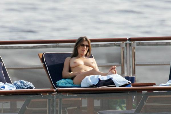 Elizabeth Hurley sunning her tits